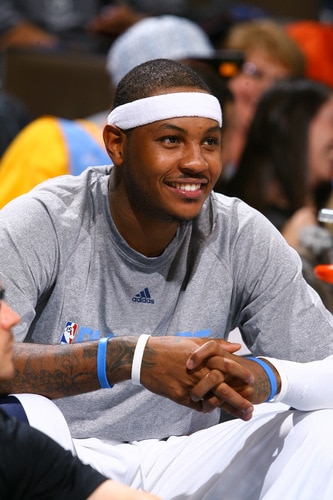 DENVER - OCTOBER 20: Carmelo Anthony #15 of the Denver Nuggets smiles during a play against the Minnesota Timberwolves on October 20, 2009 at the Pepsi Center in Denver, Colorado. <br /><br /><span class="help">(Photo by Garrett W. Ellwood/NBAE via Getty Images)</span>