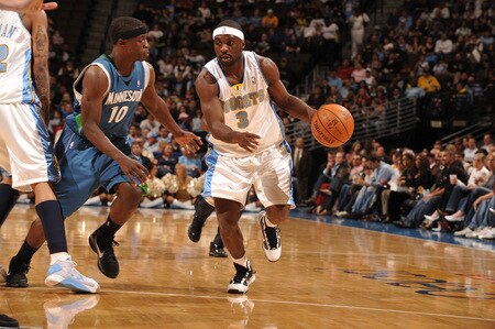 DENVER - OCTOBER 20: Ty Lawson #3 of the Denver Nuggets goes to the basket against Jonny Flynn #10 of the Minnesota Timberwolves on October 20, 2009 at the Pepsi Center in Denver, Colorado. <br /><br /><span class="help">(Photo by Garrett W. Ellwood/NBAE via Getty Images)</span>