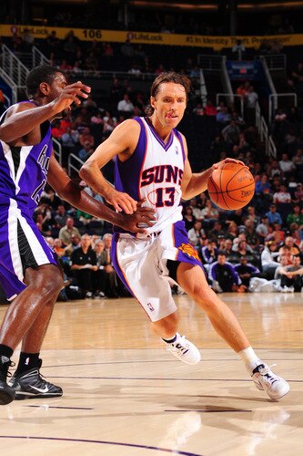 PHOENIX - OCTOBER 20: Steve Nash #13 of the Phoenix Suns drives against the Sacramento Kings in an NBA Game played on October 20, 2009 at U.S. Airways Center in Phoenix, Arizona. <br /><br /><span class="help">(Photo by P. A. Molumby/NBAE via Getty Images)</span>