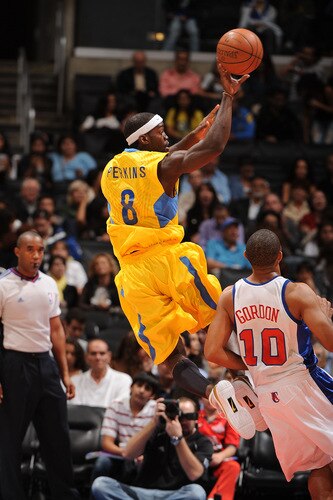 LOS ANGELES - OCTOBER 20:  Doron Perkins #8 of Maccabi Electra Tel Aviv shoots against Eric Gordon #10 of the Los Angeles Clippers at Staples Center on October 20, 2009 in Los Angeles, California. <br /><br /><span class="help">(Photo by Andrew D. Bernstein/NBAE via Getty Images)</span>