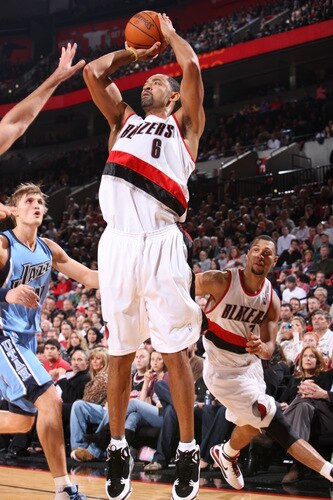 PORTLAND, OR - OCTOBER 20: Juwan Howard #6 of the Portland Trail Blazers goes up for a shot past Andrei Kirilenko #47 of the Utah Jazz during a game on October 20, 2009 at the Rose Garden Arena in Portland, Oregon. <br /><br /><span class="help">(Photo by Sam Forencich/NBAE via Getty Images)</span>