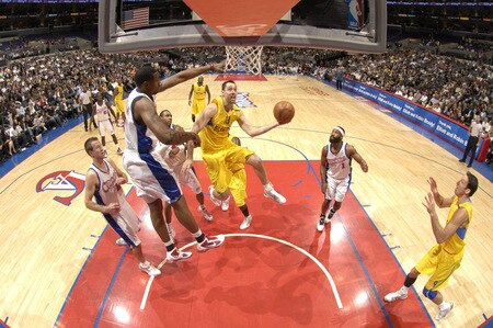 LOS ANGELES - OCTOBER 20:  Chuck Eidson #13 of Maccabi Electra Tel Aviv goes up for a shot against DeAndre Jordan #9 of the Los Angeles Clippers at Staples Center on October 20, 2009 in Los Angeles, California. <br /><br /><span class="help">(Photo by Andrew D. Bernstein/NBAE via Getty Images)</span>