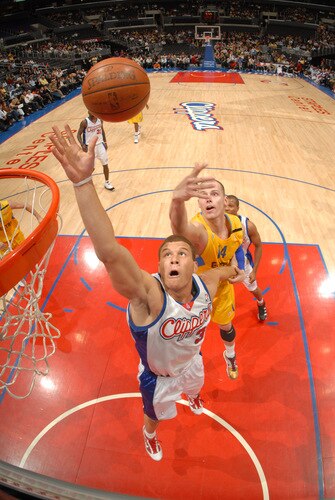 LOS ANGELES - OCTOBER 20:  Blake Griffin #32 of the Los Angeles Clippers reaches for a rebound against Maciej Lampe #14 of Maccabi Electra Tel Aviv at Staples Center on October 20, 2009 in Los Angeles, California. <br /><br /><span class="help">(Photo by Andrew D. Bernstein/NBAE via Getty Images)</span>