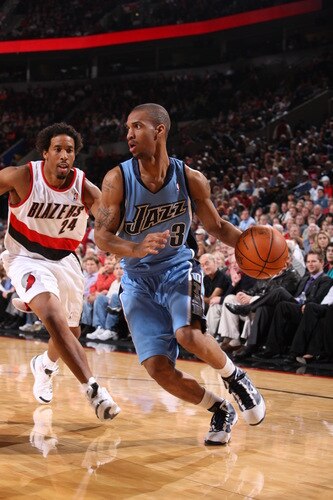 PORTLAND, OR - OCTOBER 20:  Eric Maynor #3 of the Utah Jazz drives around Andre Miller #24 of the Portland Trail Blazers during a preseason game on October 20, 2009 at the Rose Garden Arena in Portland, Oregon. <br /><br /><span class="help">(Photo by Sam Forencich/NBAE via Getty Images)</span>