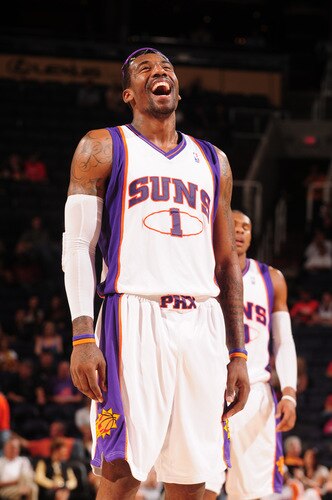 PHOENIX - OCTOBER 20:  Amare Stoudemire #1 of the Phoenix Suns laughs in the fourth quarter of a preseason NBA game against the Sacramento Kings on October 20, 2009 at U.S. Airways Center in Phoenix, Arizona. <br /><br /><span class="help">(Photo by Barry Gossage/NBAE via Getty Images)</span>