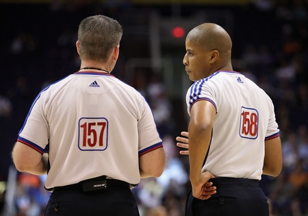 PHOENIX - OCTOBER 20:  Referees Kurt Walker and C.J. Washington talk during a break from the NBA preseason game between the Sacramento Kings and the Phoenix Suns at US Airways Center on October 20, 2009 in Phoenix, Arizona. The Suns defeated the Kings 143-127.  <br /><br /><span class="help">(Photo by Christian Petersen/Getty Images)</span>