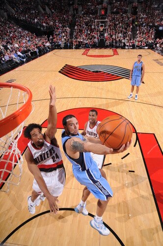 PORTLAND, OR - OCTOBER 20: Deron Williams #8 of the Utah Jazz goes up for a shot around Andre Miller #24 of the Portland Trail Blazers during a preseason NBA game on October 20, 2009 at the Rose Garden Arena in Portland, Oregon. <br /><br /><span class="help">(Photo by Sam Forencich/NBAE via Getty Images)</span>