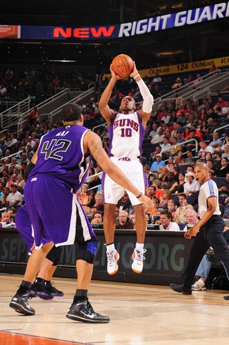 PHOENIX - OCTOBER 20: Leandro Barbosa #10 of the Phoenix Suns puts a shot up over Sean May #42 of the Sacramento Kings in a preseason NBA game on October 20, 2009 at U.S. Airways Center in Phoenix, Arizona. <br /><br /><span class="help">(Photo by Barry Gossage/NBAE via Getty Images)</span>