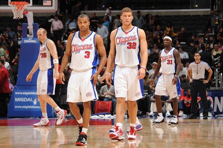 LOS ANGELES - OCTOBER 20:  Chris Kaman #35, Sebastian Telfair #3, Blake Griffin #32, and Ricky Davis #31 of the Los Angeles Clippers look on during their game against Maccabi Electra Tel Aviv at Staples Center on October 20, 2009 in Los Angeles, California. <br /><br /><span class="help">(Photo by Noah Graham/NBAE via Getty Images)</span>