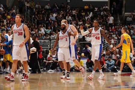 LOS ANGELES - OCTOBER 20:  Blake Griffin #32, Baron Davis #1, and Rasual Butler #45 of the Los Angeles Clippers walk off the court during their game against Maccabi Electra Tel Aviv at Staples Center on October 20, 2009 in Los Angeles, California. <br /><br /><span class="help">(Photo by Andrew D. Bernstein/NBAE via Getty Images)</span>