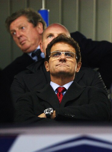 LONDON - OCTOBER 21:  England manager Fabio Capello and Roy Hodgson manager of Fulham look on prior to the UEFA Champions League Group D match between Chelsea and Atletico Madrid at Stamford Bridge on October 21, 2009 in London, England.  <br /><br /><span class="help">(Photo by Richard Heathcote/Getty Images)</span>