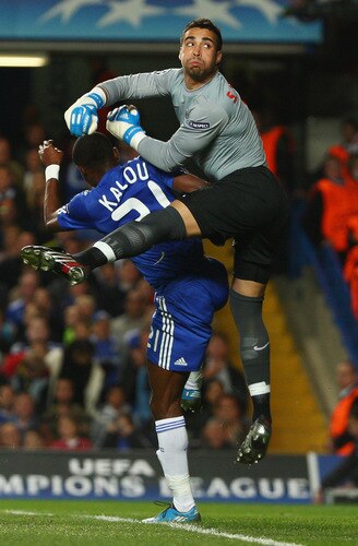 LONDON - OCTOBER 21:  Salomon Kalou of Chelsea fouls goalkeeper Sergio Asenjo of Atletico Madrid which sees Frank Lampard's goal to be ruled out during the UEFA Champions League Group D match between Chelsea and Atletico Madrid at Stamford Bridge on October 21, 2009 in London, England.  <br /><br /><span class="help">(Photo by Richard Heathcote/Getty Images)</span>