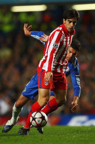 LONDON - OCTOBER 21:  Jose Manuel Jurado of Atletico Madrid holds off Michael Ballack of Chelsea looks on during the UEFA Champions League Group D match between Chelsea and Atletico Madrid at Stamford Bridge on October 21, 2009 in London, England.  <br /><br /><span class="help">(Photo by Richard Heathcote/Getty Images)</span>