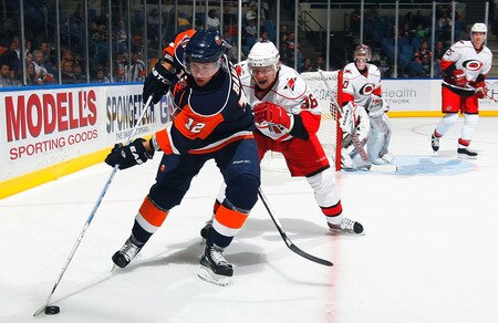 UNIONDALE, NY - OCTOBER 21:  Josh Bailey #12 of the New York Islanders skates against Jussi Jokinen #36 of the Carolina Hurricanes on October 21, 2009 at Nassau Coliseum in Uniondale, New York.  <br /><br /><span class="help">(Photo by Jim McIsaac/Getty Images)</span>