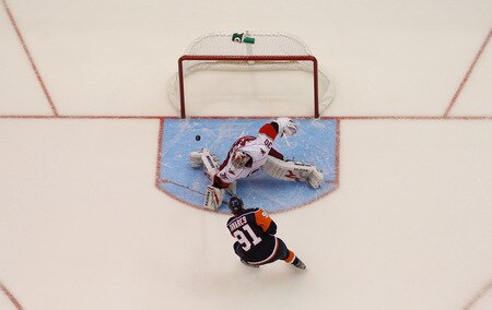 UNIONDALE, NY- OCTOBER 21: John Tavares #91 of the New York Islanders scores the winning goal in the shootout on Cam Ward #30 of the Carolina Hurricanes during the game on October 21, 2009 at  in Uniondale, NY.  <br /><br /><span class="help">(Photo by Jared Wickerham/Getty Images)</span>