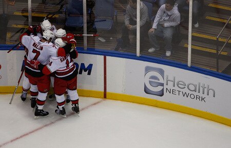 UNIONDALE, NY- OCTOBER 21: Members of the Carolina Hurricanes celebrate after Jussi Jokinen #36 scored in the third period to tie the game at three a piece during the game on October 21, 2009 at  in Uniondale, NY.  <br /><br /><span class="help">(Photo by Jared Wickerham/Getty Images)</span>