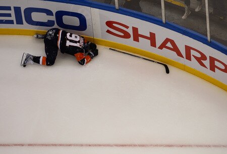 UNIONDALE, NY- OCTOBER 21: John Tavares #91 of the New York Islanders lays on the ice after getting hit against the Carolina Hurricanes during the game on October 21, 2009 at  in Uniondale, NY.  <br /><br /><span class="help">(Photo by Jared Wickerham/Getty Images)</span>