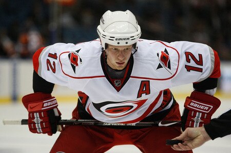 UNIONDALE, NY- OCTOBER 21: Eric Staal #12 of the Carolina Hurricanes waits for the puck to drop on a faceoff against the New York Islanders during the game on October 21, 2009 at  in Uniondale, NY.  <br /><br /><span class="help">(Photo by Jared Wickerham/Getty Images)</span>