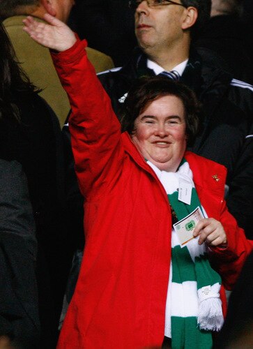 GLASGOW, SCOTLAND - OCTOBER 22:  Susan Boyle waves to fans during the UEFA Europa League Group C match between Celtic and Hamburg at Celtic Park on October 22, 2009 in Glasgow, Scotland.  <br /><br /><span class="help">(Photo by Jeff J Mitchell/Getty Images)</span>
