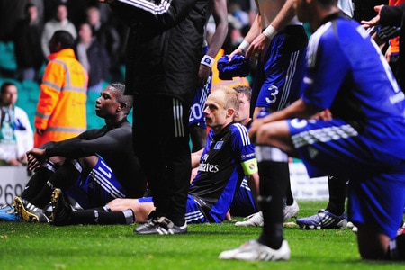 GLASGOW, SCOTLAND - OCTOBER 22:  Hamburg captain David Jarolim (centre) and team mates sit down in protest at the Celtic stewards who prevented the visiting players from approaching their own supporters after the UEFA Europa League Group C match between Celtic and Hamburg SV at Celtic Park on October 22, 2009 in Glasgow, Scotland.  <br /><br /><span class="help">(Photo by Mike Hewitt/Bongarts/Getty Images)</span>