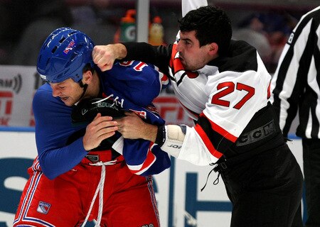 NEW YORK, NY - OCTOBER 22:  Sean Avery #16 of the New York Rangers fights with Mike Mottau #27 of the New Jersey Devils during their game on October 22, 2009 at Madison Square Garden in New York City, New York.  <br /><br /><span class="help">(Photo by Al Bello/Getty Images)</span>