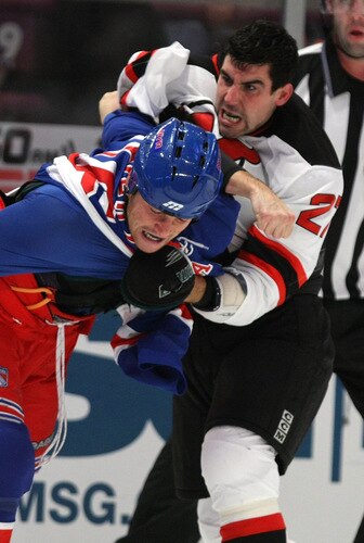 NEW YORK, NY - OCTOBER 22:  Sean Avery #16 of the New York Rangers fights with Mike Mottau #27 of the New Jersey Devils during their game on October 22, 2009 at Madison Square Garden in New York City, New York.  <br /><br /><span class="help">(Photo by Al Bello/Getty Images)</span>