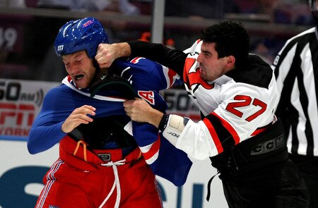 NEW YORK, NY - OCTOBER 22:  Sean Avery #16 of the New York Rangers fights with Mike Mottau #27 of the New Jersey Devils during their game on October 22, 2009 at Madison Square Garden in New York City, New York.  <br /><br /><span class="help">(Photo by Al Bello/Getty Images)</span>