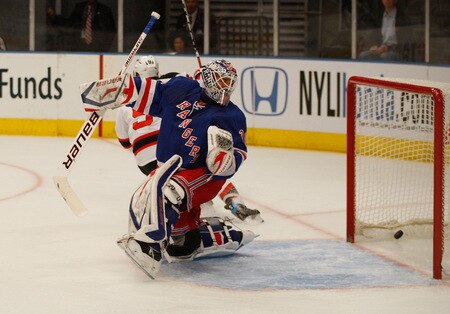 NEW YORK - OCTOBER 22:  Henrik Lundqvist #30 of the New York Rangers watches the goal by Zach Parise #9 of the New Jersey Devils go by him during the game on October 22, 2009 at Madison Square Garden in New York City. <br /><br /><span class="help">(Photo by Jared Wickerham/Getty Images)</span>