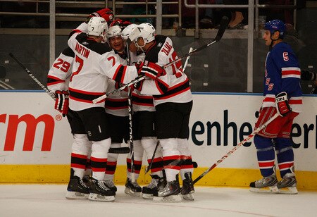 NEW YORK - OCTOBER 22: Members of the New Jersey Devils celebrate with Nicklas Bergfors #18 after he scored in the first period against the New York Rangers during the game on October 22, 2009 at Madison Square Garden in New York City. <br /><br /><span class="help">(Photo by Jared Wickerham/Getty Images)</span>