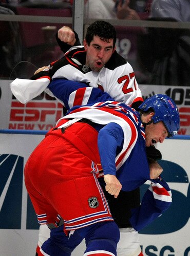 NEW YORK, NY - OCTOBER 22:  Sean Avery #16 of the New York Rangers fights with Mike Mottau #27 of the New Jersey Devils during their game on October 22, 2009 at Madison Square Garden in New York City, New York.  <br /><br /><span class="help">(Photo by Al Bello/Getty Images)</span>