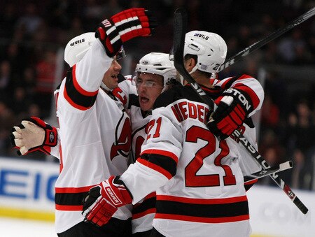 NEW YORK, NY - OCTOBER 22:  Zach Parise #9 celebrates a goal with teamates against  the New Jersey Devils during their game on October 22, 2009 at Madison Square Garden in New York City, New York.  <br /><br /><span class="help">(Photo by Al Bello/Getty Images)</span>