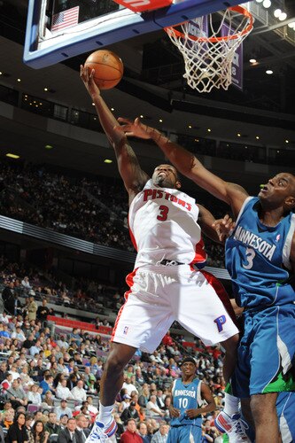 AUBURN HILLS, MI - OCTOBER 22:  Rodney Stuckey #3 of the Detroit Pistons goes up for a shot attempt over Damien Wilkins #3 of the Minnesota Timberwolves in a preseason game at the Palace of Auburn Hills on October 22, 2009 in Auburn Hills, Michigan.  <br /><br /><span class="help">(Photo by Allen Einstein/NBAE via Getty Images)</span>