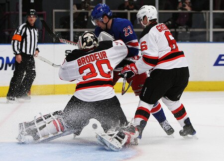NEW YORK, NY - OCTOBER 22:  Martin Brodeur #30 of the New Jersey Devils makes a save against Chris Drury #23 of the New York Rangers during their game on October 22, 2009 at Madison Square Garden in New York City, New York.  <br /><br /><span class="help">(Photo by Al Bello/Getty Images)</span>