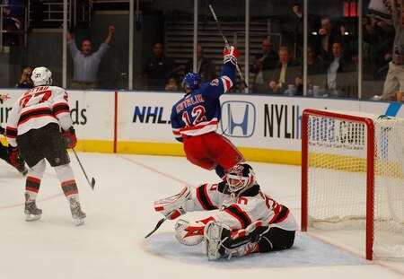 NEW YORK - OCTOBER 22:  Ales Kotalik #12 of the New York Rangers scores on Martin Brodeur #30 of the New Jersey Devils during the game on October 22, 2009 at Madison Square Garden in New York City.  <br /><br /><span class="help">(Photo by Jared Wickerham/Getty Images)</span>