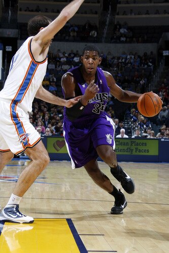 OKLAHOMA CITY - OCTOBER 22:  Jason Thompson #34 of the Sacremento Kings goes toward the basket Nenad Krstic #12 of the Oklahoma City Thunder on October 22, 2009 at the Ford Center in Oklahoma City, Oklahoma. <br /><br /><span class="help">(Photo by Layne Murdoch/NBAE via Getty Images)</span>