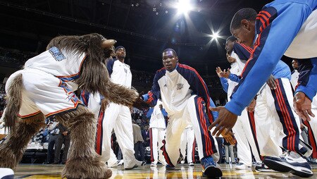 OKLAHOMA CITY - OCTOBER 22:  Kevin Durant #35 of the Oklahoma City Thunder shakes the hands of team mates and Rumble the Bison before tip off against the Sacremento Kings on October 22, 2009 at the Ford Center in Oklahoma City, Oklahoma. <br /><br /><span class="help">(Photo by Layne Murdoch/NBAE via Getty Images)</span>