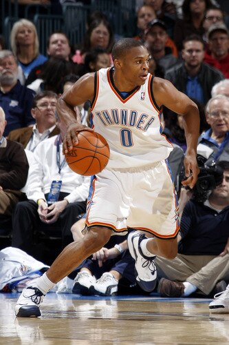 OKLAHOMA CITY - OCTOBER 22:  Russell Westbrook #0 of the Oklahoma City Thunder dribbles the ball up court during a game against the Sacremento Kings on October 22, 2009 at the Ford Center in Oklahoma City, Oklahoma. <br /><br /><span class="help">(Photo by Layne Murdoch/NBAE via Getty Images)</span>