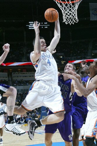 OKLAHOMA CITY - OCTOBER 22:  Nick Collison #4 of the Oklahoma City Thunder grabs a rebound from Spencer Hawes #31of the Sacremento Kings on October 22, 2009 at the Ford Center in Oklahoma City, Oklahoma. <br /><br /><span class="help">(Photo by Layne Murdoch/NBAE via Getty Images)</span>