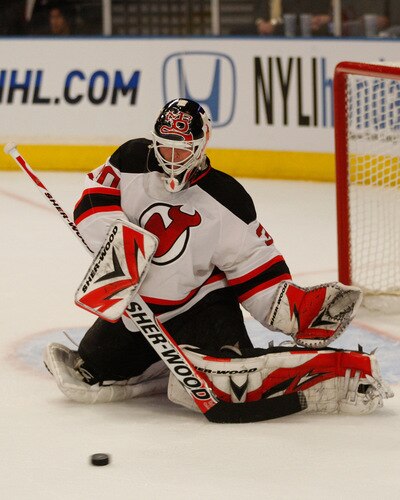 NEW YORK - OCTOBER 22: Martin Brodeur #30 of the New Jersey Devils makes a stop against the New York Rangers during the game on October 22, 2009 at Madison Square Garden in New York City. <br /><br /><span class="help">(Photo by Jared Wickerham/Getty Images)</span>