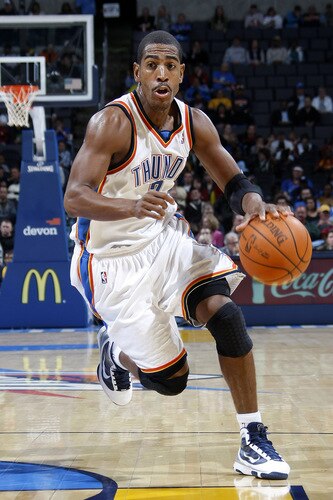 OKLAHOMA CITY - OCTOBER 22:  Kevin Ollie #7 of the Oklahoma City Thunder dribbles the ball up court during a game against the Sacremento Kings on October 22, 2009 at the Ford Center in Oklahoma City, Oklahoma. <br /><br /><span class="help">(Photo by Layne Murdoch/NBAE via Getty Images)</span>