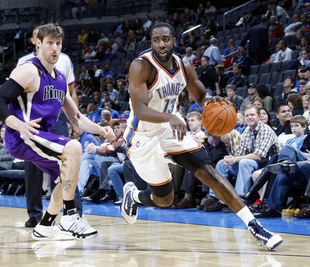 OKLAHOMA CITY - OCTOBER 22:  James Harden #13 of the Oklahoma City Thunder dribbles around Andres Nocioni #5 of the Sacremento Kings on October 22, 2009 at the Ford Center in Oklahoma City, Oklahoma. <br /><br /><span class="help">(Photo by Layne Murdoch/NBAE via Getty Images)</span>