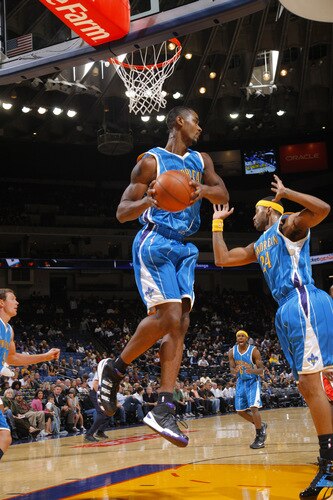 OAKLAND, CA - OCTOBER 22: Hilton Armstrong #12 of the New Orleans Hornets grabs a rebound against the Golden State Warriors  on October 22, 2009 at Oracle Arena in Oakland, California. <br /><br /><span class="help">(Photo by Rocky Widner/NBAE via Getty Images)</span>