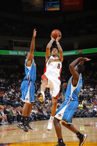 OAKLAND, CA - OCTOBER 22: Monta Ellis #8 of the Golden State Warriors sinks a jumper against the New Orleans Hornets on October 22, 2009 at Oracle Arena in Oakland, California. <br /><br /><span class="help">(Photo by Rocky Widner/NBAE via Getty Images)</span>