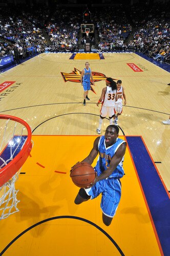 OAKLAND, CA - OCTOBER 22: Darren Collison #2 of the New Orleans Hornets winds up for the dunk against the Golden State Warriors on October 22, 2009 at Oracle Arena in Oakland, California. <br /><br /><span class="help">(Photo by Rocky Widner/NBAE via Getty Images)</span>