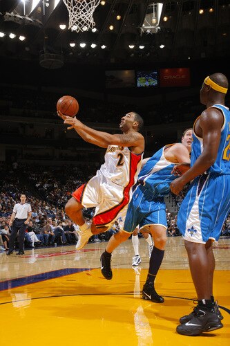 OAKLAND, CA - OCTOBER 22: Acie Law #2 of the Golden State Warriors puts up two against the New Orleans Hornets on October 22, 2009 at Oracle Arena in Oakland, California. <br /><br /><span class="help">(Photo by Rocky Widner/NBAE via Getty Images)</span>