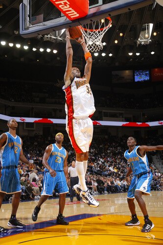 OAKLAND, CA - OCTOBER 22: Mikki Moore #33 of the Golden State Warriors goes up for the uncontested dunk against the New Orleans Hornets on October 22, 2009 at Oracle Arena in Oakland, California. <br /><br /><span class="help">(Photo by Rocky Widner/NBAE via Getty Images)</span>