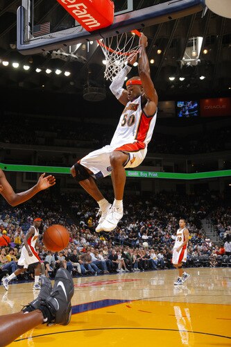 OAKLAND, CA - OCTOBER 22: Corey Maggette #50 of the Golden State Warriors goes coast to coast for the dunk against the New Orleans Hornets on October 22, 2009 at Oracle Arena in Oakland, California. <br /><br /><span class="help">(Photo by Rocky Widner/NBAE via Getty Images)</span>