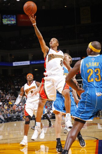 OAKLAND, CA - OCTOBER 22: Monta Ellis # 8 of the Golden State Warriors connects on a lay-up against the New Orleans Hornets on October 22, 2009 at Oracle Arena in Oakland, California. <br /><br /><span class="help">(Photo by Rocky Widner/NBAE via Getty Images)</span>