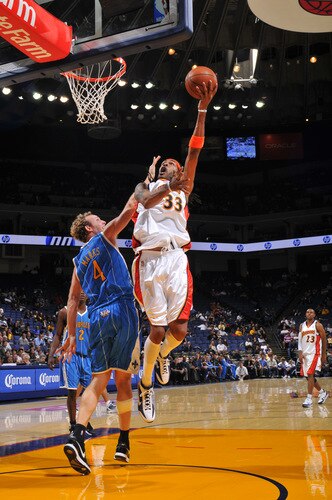 OAKLAND, CA - OCTOBER 22: Mikki Moore #33 of the Golden State Warriors scores against the New Orleans Hornets on October 22, 2009 at Oracle Arena in Oakland, California. <br /><br /><span class="help">(Photo by Rocky Widner/NBAE via Getty Images)</span>