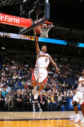 OAKLAND, CA - OCTOBER 22: Monta Ellis #8 of the Golden State Warriors is all alone for the lay-up against the New Orleans Hornets on October 22, 2009 at Oracle Arena in Oakland, California. <br /><br /><span class="help">(Photo by Rocky Widner/NBAE via Getty Images)</span>